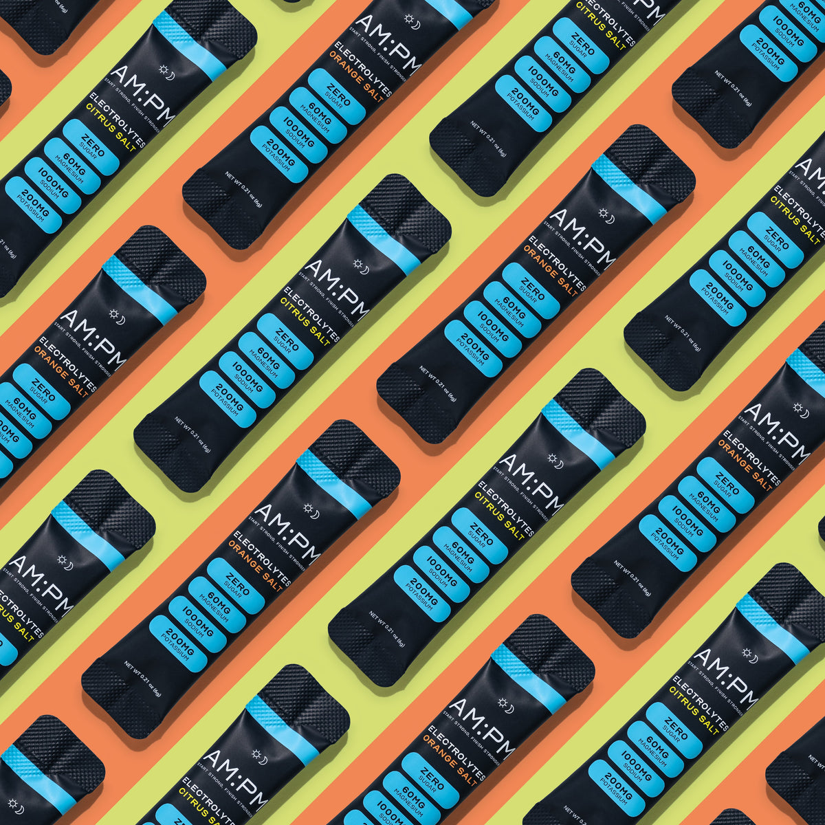 AM:PM Citrus Salt and Orange Salt electrolyte sachets arranged in a repeating pattern