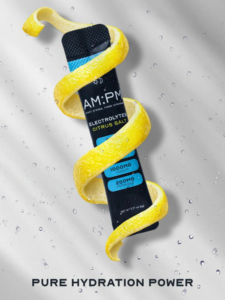 AM:PM Citrus Salt electrolyte sachet with a curled lemon peel